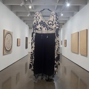 Elegant Black and White Floral Women's Dress with Dramatic Long Sleeves